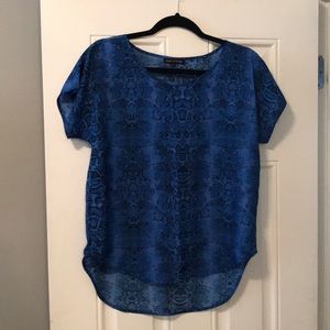 Hi-low blue snakeskin blouse